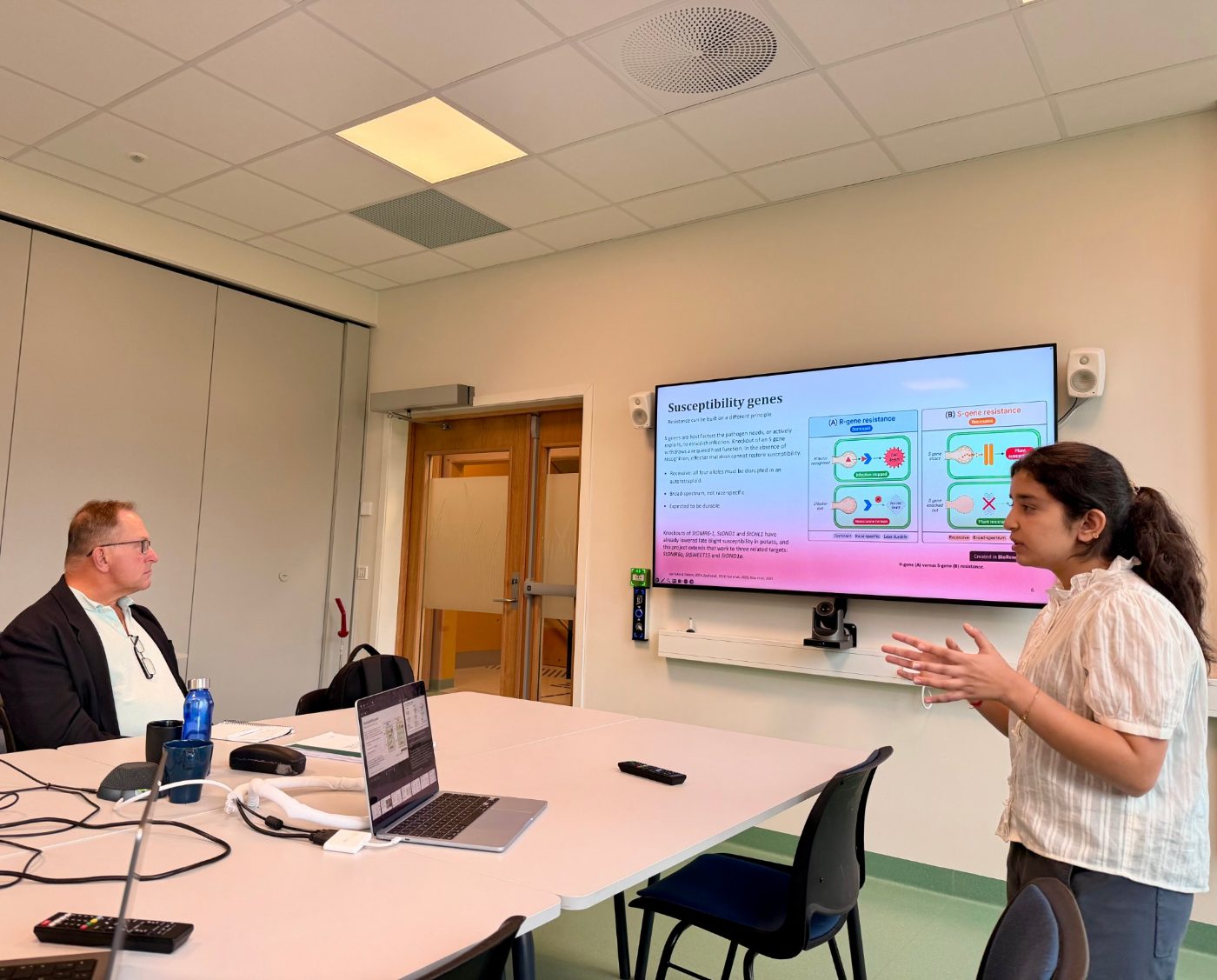 Gargi Dutta presenting on susceptibility genes during her thesis defense